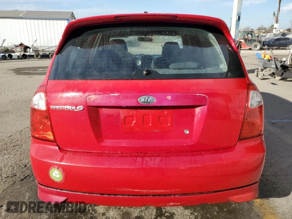 2005 Kia Spectra with VIN KNAFE162255129620, listed as a Copart auction lot 86822464 with 249,516 mi miles and Salvage Title. Bid and sale history available at carsss.com. Image 6.
