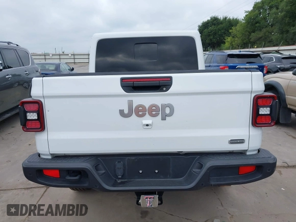 2021 Jeep Gladiator High Altitude with VIN 1C6HJTFG8ML551570, listed as a IAAI auction lot 42229235 with 56,959 mi miles and . Bid and sale history available at DreamBid. Image 17.