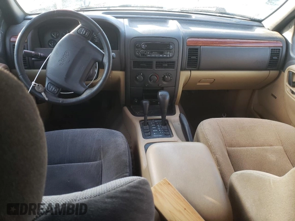 1999 Jeep Grand Cherokee Laredo with VIN 1J4GW58SXXC706962, listed as a Copart auction lot 88325515 with Not provided miles and Clean title. Bid and sale history available at DreamBid. Image 8.