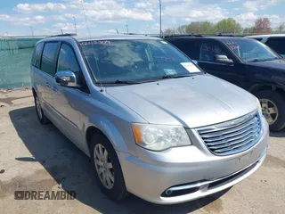 2011 Chrysler Town & Country Touring L with VIN 2A4RR8DG8BR797653, listed as a IAAI auction lot 42115304 with 185,613 mi miles and . Bid and sale history available at carsss.com. Image 1.