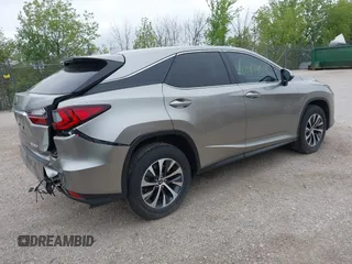 2022 Lexus RX 350 with VIN 2T2AZMDA7NC352957, listed as a IAAI auction lot 42297457 with 34,576 mi miles and . Bid and sale history available at DreamBid. Image 4.