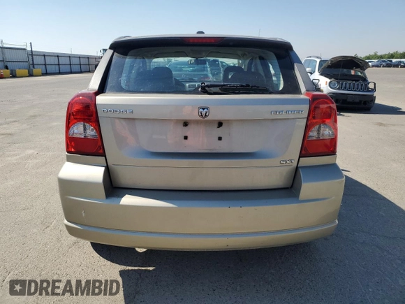 2009 Dodge Caliber SXT z VIN 1B3HB48A19D199410, wystawiony jako Copart lot #55133965 z przebiegiem 141 658 mil mil oraz Szkoda całkowita • Salvage title. Historia ofert i sprzedaży dostępna na DreamBid. Obrazek 6.