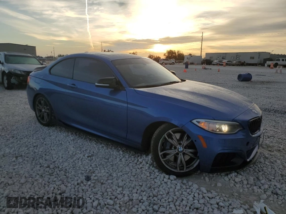 2015 BMW 2 Series M235i with VIN WBA1J7C59FV359017, listed as a Copart auction lot 82226554 with 87,881 mi miles and Salvage Title. Bid and sale history available at carsss.com. Image 4.