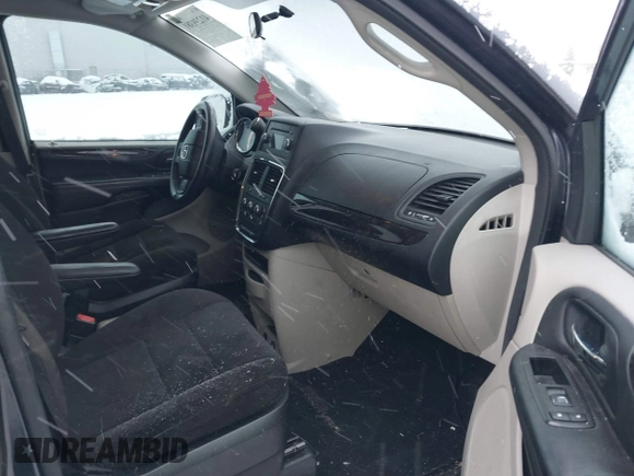 2013 Dodge Grand Caravan SE with VIN 2C4RDGBGXDR746630, listed as a IAAI auction lot 41239381 with 213,421 mi miles and . Bid and sale history available at DreamBid. Image 5.