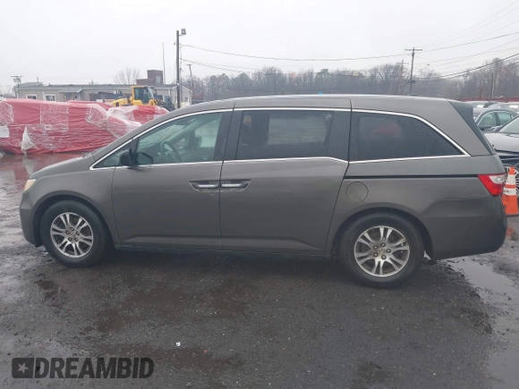 2012 Honda Odyssey EX-L with VIN 5FNRL5H64CB037689, listed as a IAAI auction lot 41857822 with 121,601 mi miles and . Bid and sale history available at carsss.com. Image 14.