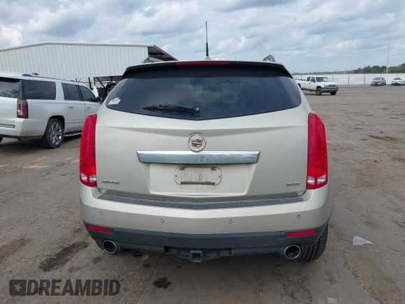 2014 Cadillac SRX Luxury Collection with VIN 3GYFNBE38ES518054, listed as a IAAI auction lot 41520886 with 108,905 mi miles and . Bid and sale history available at DreamBid. Image 16.