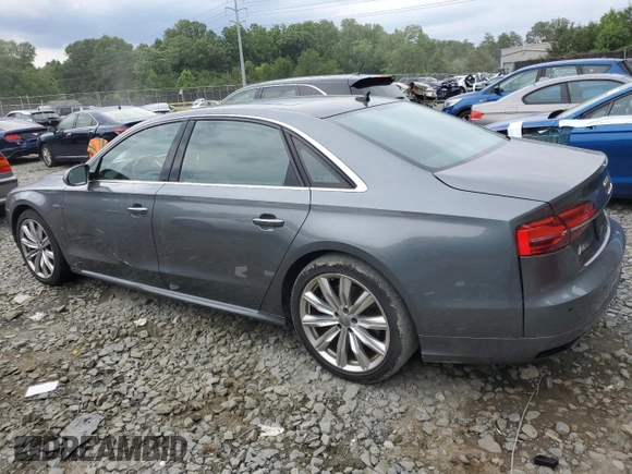 2016 Audi A8 L 4.0T Sport with VIN WAU43AFD0GN010739, listed as a Copart auction lot 63829554 with 201,213 mi miles and Salvage Title. Bid and sale history available at carsss.com. Image 2.