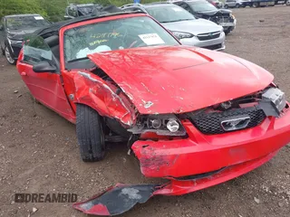 2004 Ford Mustang Deluxe with VIN 1FAFP44494F112900, listed as a IAAI auction lot 42117976 with Not provided miles and . Bid and sale history available at DreamBid. Image 1.
