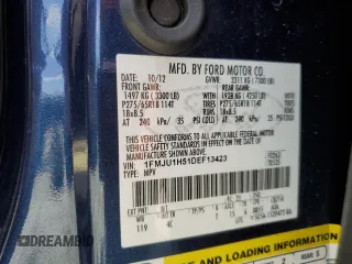 2013 Ford Expedition XLT z VIN 1FMJU1H51DEF13423, wystawiony jako Copart lot #60702695 z przebiegiem 228 355 mil mil oraz Szkoda całkowita • Salvage title. Historia ofert i sprzedaży dostępna na DreamBid. Obrazek 13.