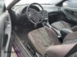 1995 Ford Probe z VIN 1ZVLT22B9S5142588, wystawiony jako Copart lot #89005925 z przebiegiem 83 937 mil mil oraz Szkody całkowita. Historia ofert i sprzedaży dostępna na DreamBid. Obrazek 8.