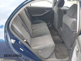2003 Toyota Corolla CE with VIN 2T1BR32E33C029785, listed as a IAAI auction lot 42147204 with 284,900 mi miles and . Bid and sale history available at DreamBid. Image 8.