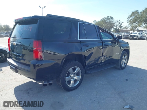 2018 Chevrolet Tahoe LT with VIN 1GNSCBKCXJR132867, listed as a IAAI auction lot 41456319 with 59,131 mi miles and . Bid and sale history available at DreamBid. Image 4.