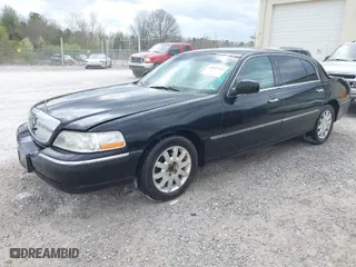 2010 Lincoln Town Car Executive L w/Livery Pkg with VIN 2LNBL8EV1AX601192, listed as a IAAI auction lot 41835707 with NaN miles. Bid and sale history available at carsss.com. Image 2.