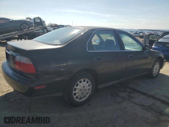 1996 Honda Accord EX with VIN 1HGCD5657TA159695, listed as a Copart auction lot 46241935 with 87,847 mi miles and Salvage Title. Bid and sale history available at DreamBid. Image 3.