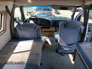 1996 Ford Econoline Cargo z VIN 1FDHS24H9THA55752, wystawiony jako IAAI lot #42052800 z przebiegiem 117 680 mil mil oraz . Historia ofert i sprzedaży dostępna na DreamBid. Obrazek 21.