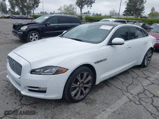 2016 Jaguar XJ with VIN SAJWA2GE3GMV93216, listed as a IAAI auction lot 41890225 with 70,007 mi miles. Bid and sale history available at carsss.com. Image 2.