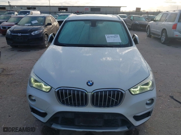 2016 BMW X1 xDrive28i with VIN WBXHT3C3XGP889461, listed as a IAAI auction lot 41757627 with 105,681 mi miles. Bid and sale history available at carsss.com. Image 12.