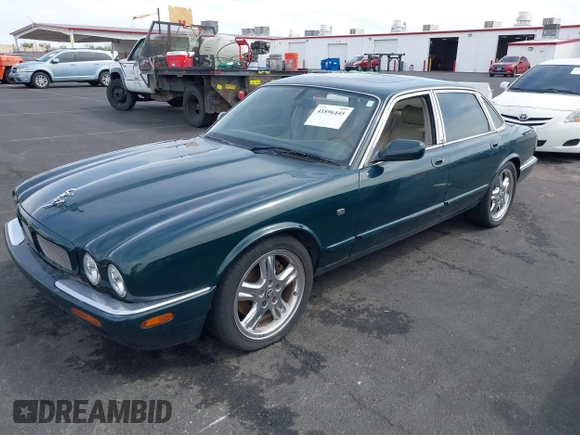2003 Jaguar XJ with VIN SAJDA15B73MF53499, listed as a IAAI auction lot 41896445 with 95,055 mi miles and . Bid and sale history available at DreamBid. Image 2.