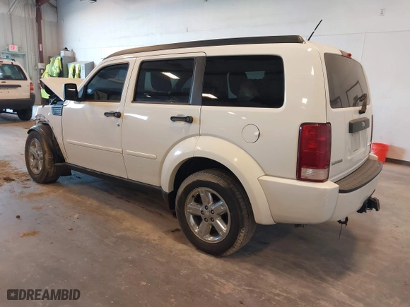 2008 Dodge Nitro SXT with VIN 1D8GU28K48W272971, listed as a IAAI auction lot 41774435 with 225,071 mi miles. Bid and sale history available at carsss.com. Image 3.