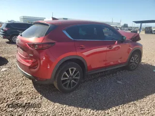 2017 Mazda CX-5 Grand Touring with VIN JM3KFBDL0H0118057, listed as a Copart auction lot 50121335 with 148,275 mi miles and Salvage Title. Bid and sale history available at carsss.com. Image 3.