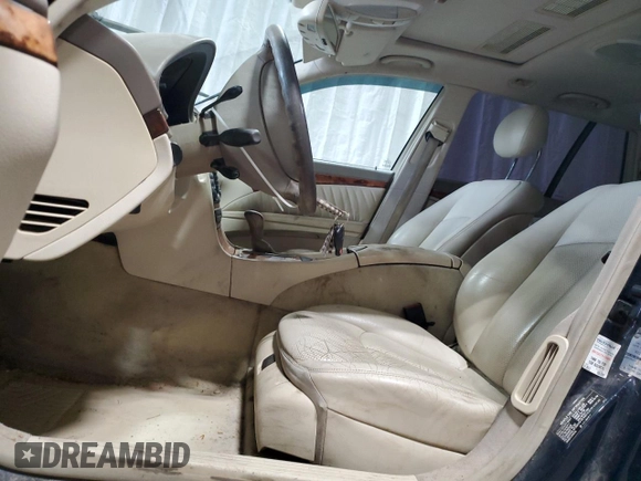 2004 Mercedes-Benz E 500 with VIN WDBUH83J74X165407, listed as a Copart auction lot 52716275 with 255,752 mi miles and Salvage Title. Bid and sale history available at carsss.com. Image 7.