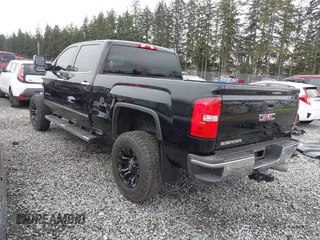 2018 GMC Sierra 2500HD SLT with VIN 1GT12TEY4JF203731, listed as a IAAI auction lot 41858306 with 86,931 mi miles. Bid and sale history available at carsss.com. Image 3.