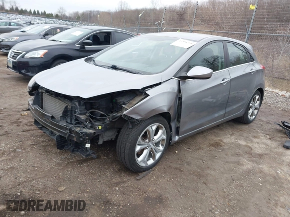 2013 Hyundai Elantra GT with VIN KMHD35LE0DU148382, listed as a IAAI auction lot 41898768 with 77,673 mi miles. Bid and sale history available at carsss.com. Image 2.