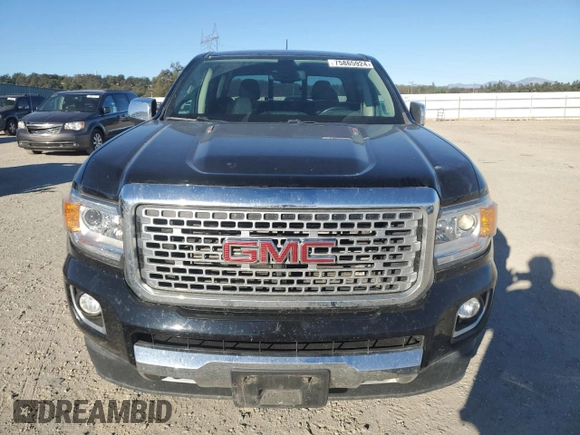 2018 GMC Canyon 4WD Denali with VIN 1GTP6EE15J1207359, listed as a Copart auction lot 75865924 with 59,177 mi miles and Salvage Title. Bid and sale history available at carsss.com. Image 5.