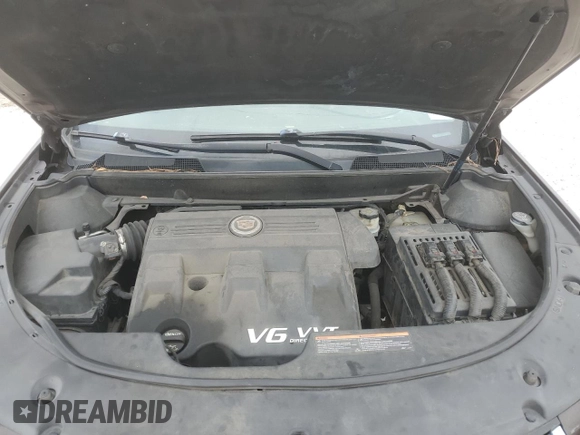 2015 Cadillac SRX Performance Collection with VIN 3GYFNCE38FS571733, listed as a Copart auction lot 54946215 with 147,343 mi miles and Salvage title. Bid and sale history available at DreamBid. Image 12.
