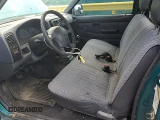 1997 Nissan Frontier XE with VIN 1N6SD11SXVC332100, listed as a Copart auction lot 54330245 with 203,959 mi miles and Salvage title. Bid and sale history available at DreamBid. Image 7.