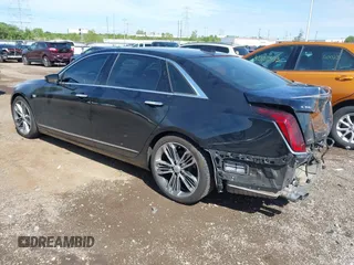 2018 Cadillac CT6 Sport AWD with VIN 1G6KN5R61JU101754, listed as a IAAI auction lot 42128916 with 90,487 mi miles and . Bid and sale history available at DreamBid. Image 3.