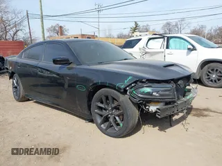 2020 Dodge Charger R/T with VIN 2C3CDXCTXLH145129, listed as a IAAI auction lot 41769766 with 56,213 mi miles and . Bid and sale history available at carsss.com. Image 1.