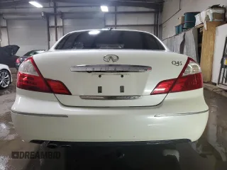 2005 Infiniti Q45 z VIN JNKBF01A55M101676, wystawiony jako Copart lot #44019275 z przebiegiem 157 254 mil mil oraz Szkody całkowita. Historia ofert i sprzedaży dostępna na DreamBid. Obrazek 6.