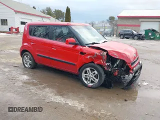 2010 Kia Soul + with VIN KNDJT2A27A7160893, listed as a IAAI auction lot 41312041 with 221,568 mi miles. Bid and sale history available at carsss.com. Image 1.