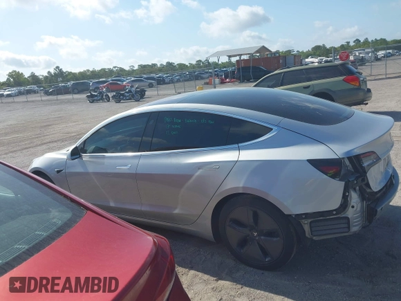 2018 Tesla Model 3 Long Range Battery with VIN 5YJ3E1EB7JF104356, listed as a IAAI auction lot 41936961 with 90,932 mi miles and . Bid and sale history available at DreamBid. Image 15.