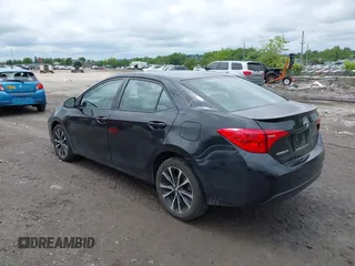 2017 Toyota Corolla L with VIN 2T1BURHE1HC789813, listed as a IAAI auction lot 42369061 with 84,666 mi miles and . Bid and sale history available at DreamBid. Image 3.