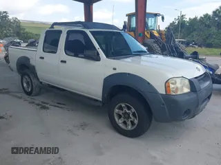 2001 Nissan Frontier SE z VIN 1N6ED27T61C300323, wystawiony jako IAAI lot #42401852 z przebiegiem 317 648 mil mil oraz . Historia ofert i sprzedaży dostępna na DreamBid. Obrazek 1.