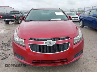 2014 Chevrolet Cruze 1LT with VIN 1G1PC5SB1E7274803, listed as a IAAI auction lot 41897844 with 175,081 mi miles and . Bid and sale history available at DreamBid. Image 6.