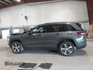 2022 Jeep Grand Cherokee with VIN 1C4RJYB65N8758560, listed as a IAAI auction lot 42182021 with 28,096 mi miles and . Bid and sale history available at DreamBid. Image 13.