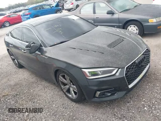 2018 Audi A5 Sportback Prestige z VIN WAUCNCF59JA080233, wystawiony jako IAAI lot #41717290 z przebiegiem 154 361 mil mil oraz . Historia ofert i sprzedaży dostępna na DreamBid. Obrazek 1.