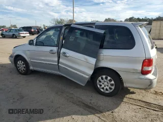 2005 Kia Sedona LX with VIN KNDUP132X56721558, listed as a Copart auction lot 88574685 with 176,660 mi miles and Salvage Title. Bid and sale history available at carsss.com. Image 2.