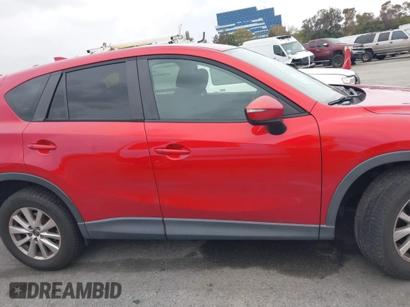 2016 Mazda CX-5 Touring with VIN JM3KE2CY3G0877185, listed as a IAAI auction lot 41729243 with 144,656 mi miles. Bid and sale history available at carsss.com. Image 13.