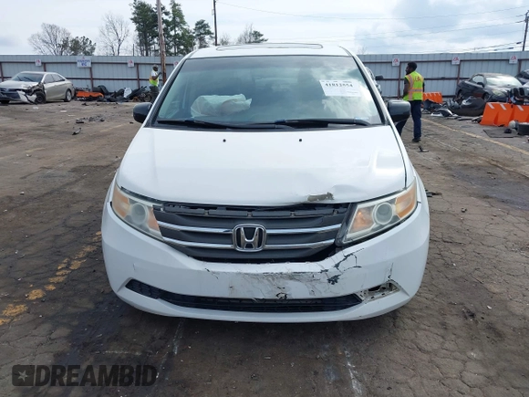 2011 Honda Odyssey EX-L with VIN 5FNRL5H67BB070541, listed as a IAAI auction lot 41812554 with 150,898 mi miles and . Bid and sale history available at DreamBid. Image 6.
