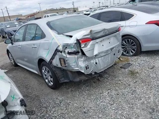 2021 Toyota Corolla LE with VIN 5YFEPMAE2MP212056, listed as a IAAI auction lot 41883519 with 69,215 mi miles. Bid and sale history available at carsss.com. Image 3.