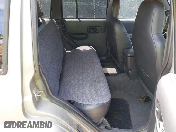 2000 Jeep Cherokee z VIN 1J4FF48S5YL138739, wystawiony jako IAAI lot #42109922 z przebiegiem 199 621 mil mil oraz . Historia ofert i sprzedaży dostępna na DreamBid. Obrazek 8.