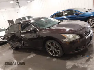 2014 Nissan Maxima SV z VIN 1N4AA5AP5EC910605, wystawiony jako IAAI lot #42082685 z przebiegiem 83 628 mil mil oraz . Historia ofert i sprzedaży dostępna na DreamBid. Obrazek 14.