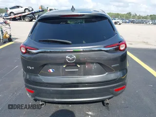 2021 Mazda CX-9 Touring с VIN JM3TCACY4M0511512, выставлен на аукционе IAAI как лот 42376544 с пробегом 50 485 миль миль и . История ставок и продаж доступна на DreamBid. Изображение 16.