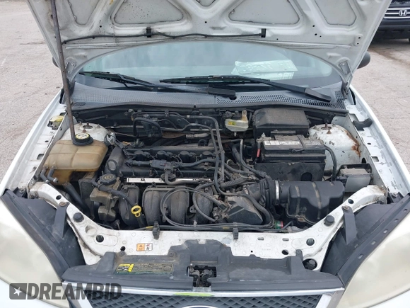 2007 Ford Focus SE with VIN 1FAFP36NX7W146610, listed as a IAAI auction lot 42542250 with Not provided miles and . Bid and sale history available at DreamBid. Image 10.