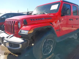 2021 Jeep Gladiator Freedom z VIN 1C6HJTAG7ML609661, wystawiony jako IAAI lot #41410756 z przebiegiem 44 636 mil mil oraz . Historia ofert i sprzedaży dostępna na DreamBid. Obrazek 6.
