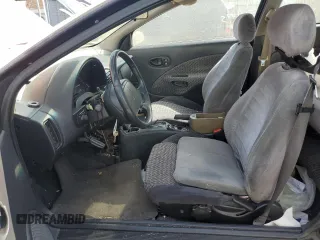 1999 Saturn SC with VIN 1G8ZY127XXZ314531, listed as a Copart auction lot 49653805 with 130,457 mi miles and Salvage Title. Bid and sale history available at carsss.com. Image 7.